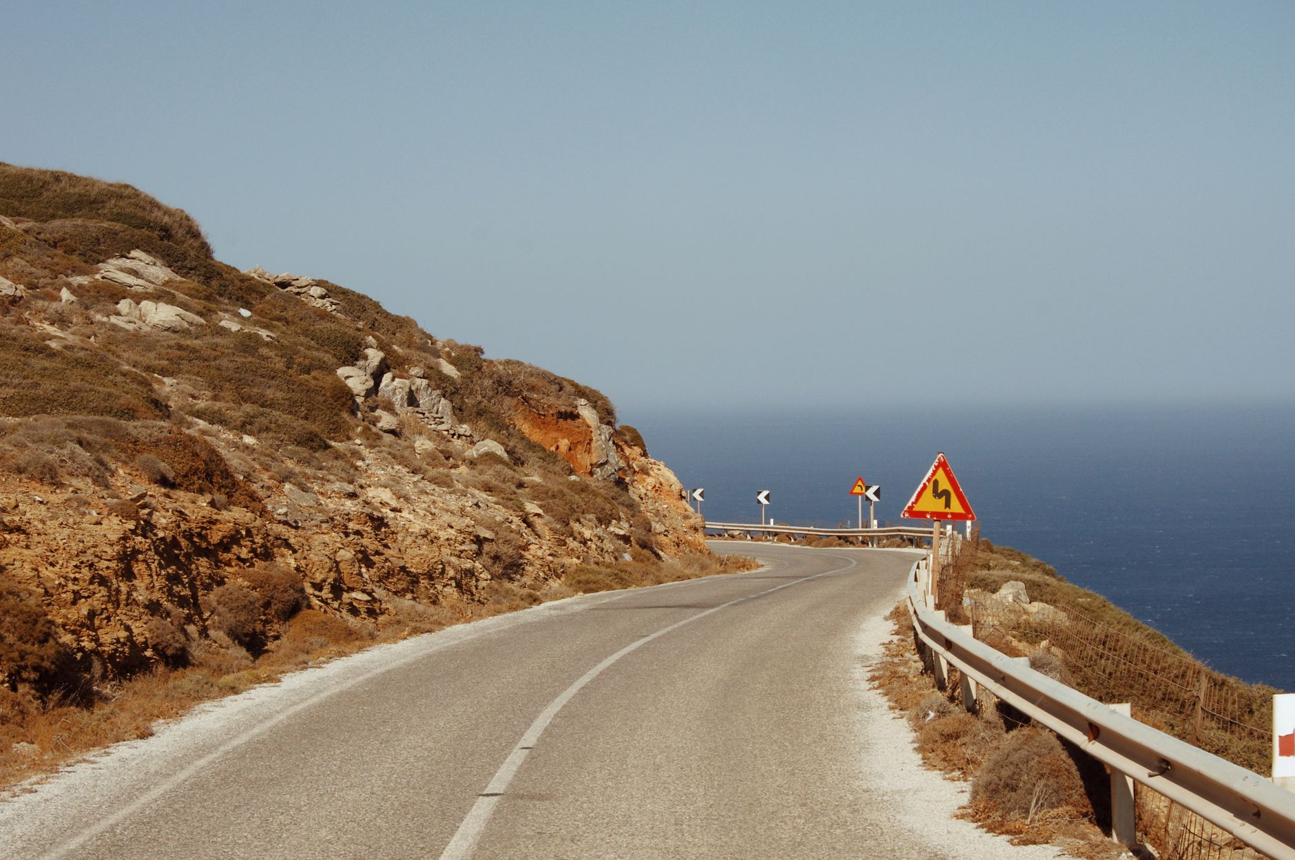 Quiet scenic road through coastal hills